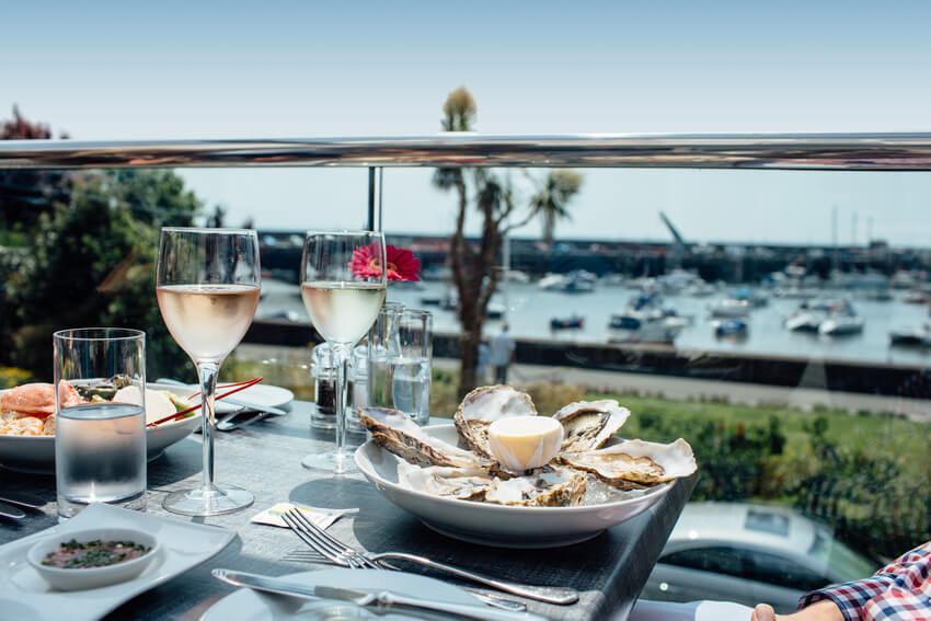 Eating oysters in Gorey Jersey